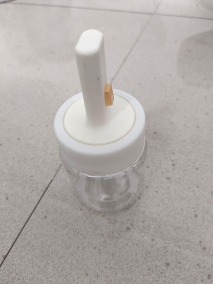 Glass Tank with Integrated Spoon